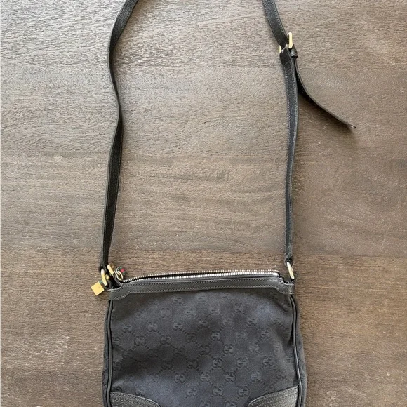 Gucci Black Crossbody Bag with Gold Accents